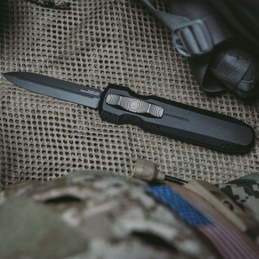 sog pentagon otf knife in open position